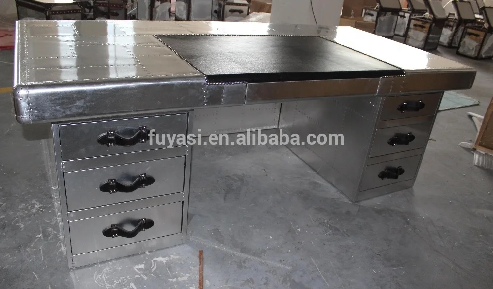 
aviator aluminum and leather covering office desk 