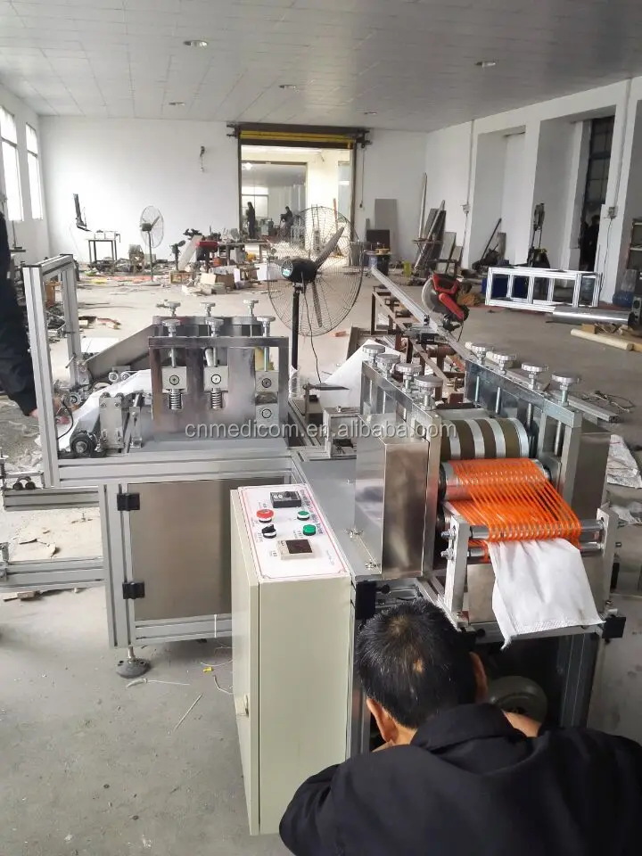 
Nonwoven Shoe Cover Making Machine 