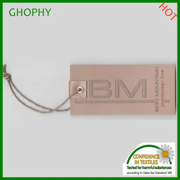 Embossed paperboard security hologram foil hang tag