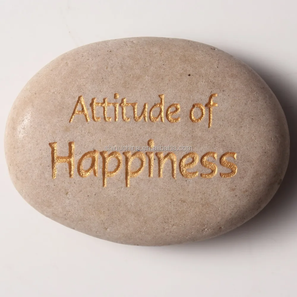 
natual river rock engraved with attitude of happiness 