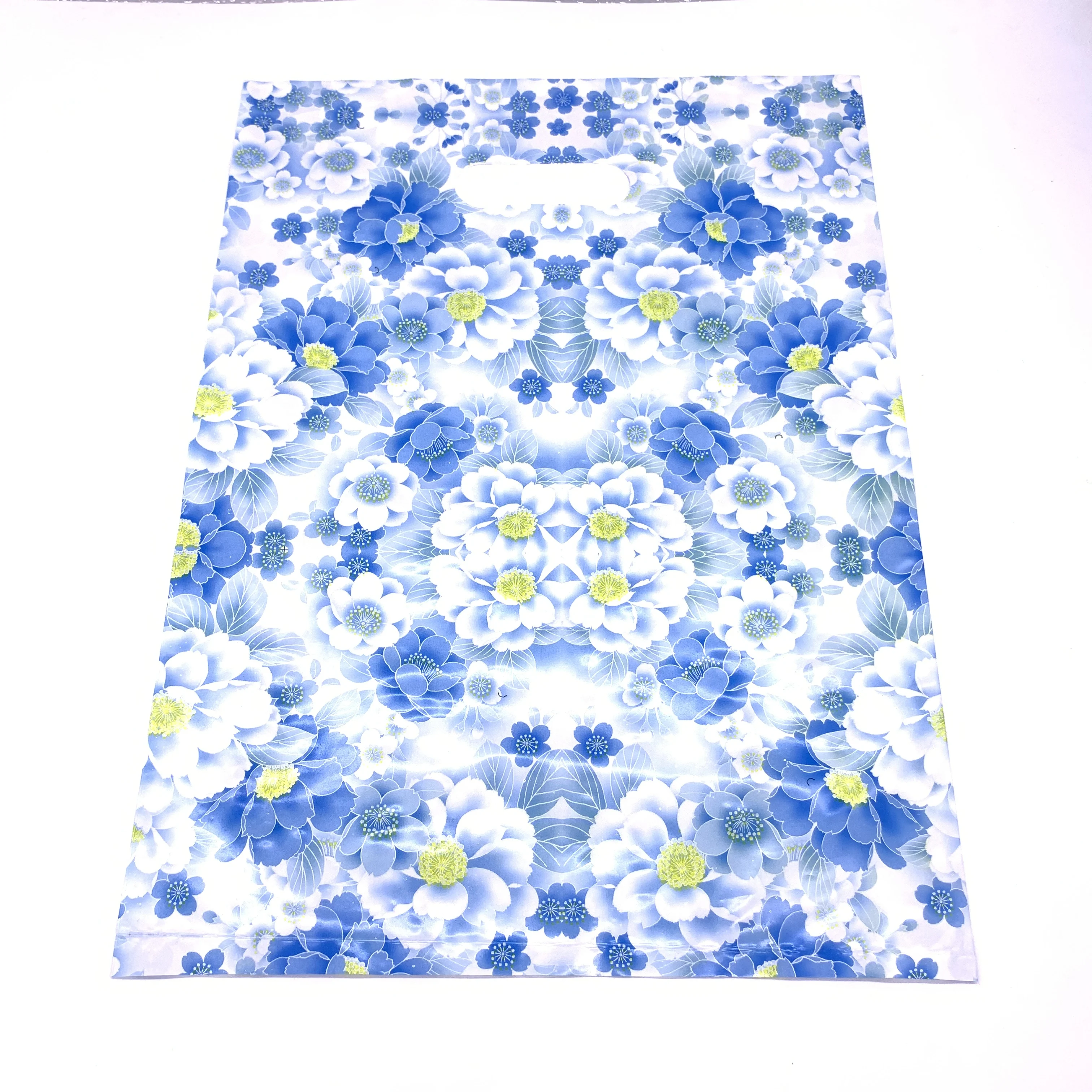 Custom made handle die cut plastic bags