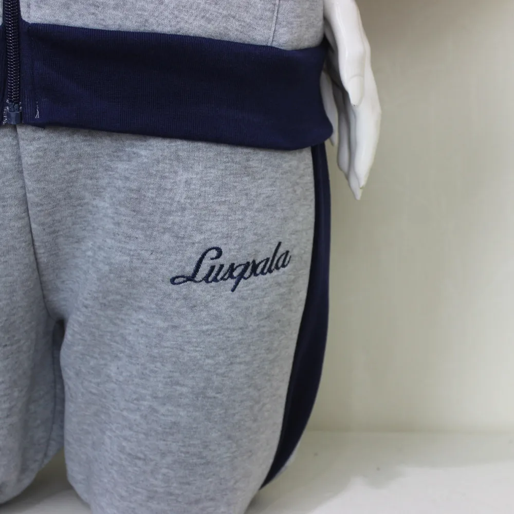 Фабричный спортивный костюм штаны и толстовки оптовая продажа китайская спортивная одежда из полиэстера для взрослых женщин