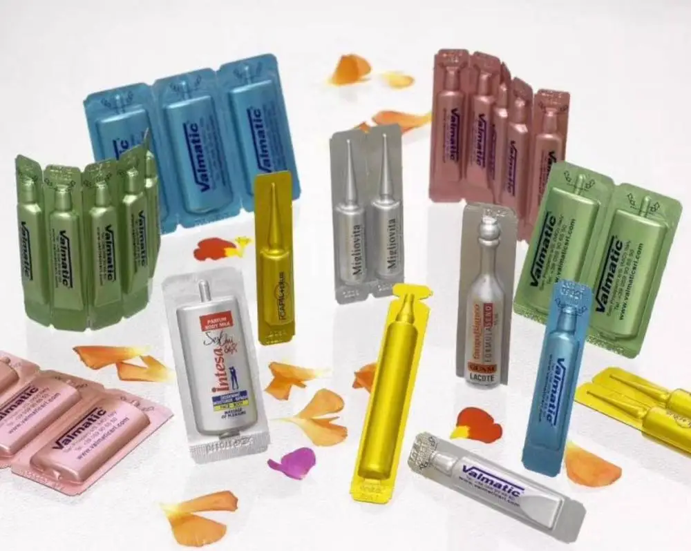 Plastic ampoule filling and sealing machine