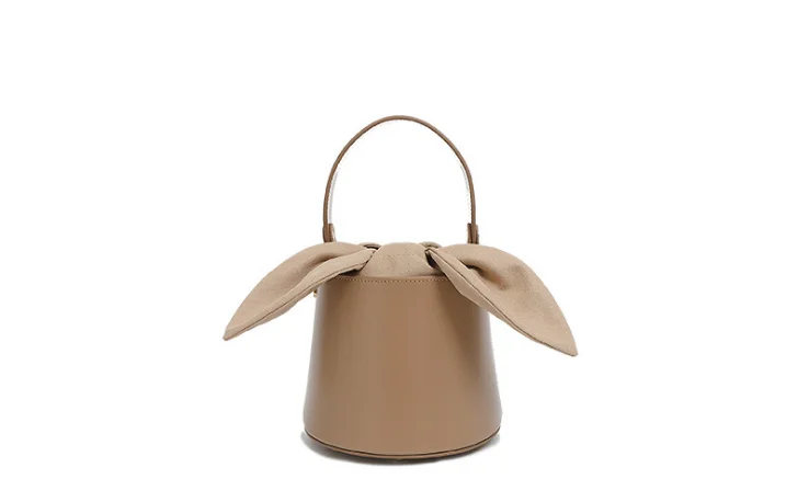 Niche design leather handbag bucket bag female 2019 new bow shoulder slung mobile handbag