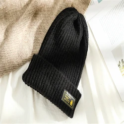 Wholesale Custom Winter Woman Men Acrylic Cheap Plain Solid Color Crochet Warm Knit Beanie Cap With Leather Logo