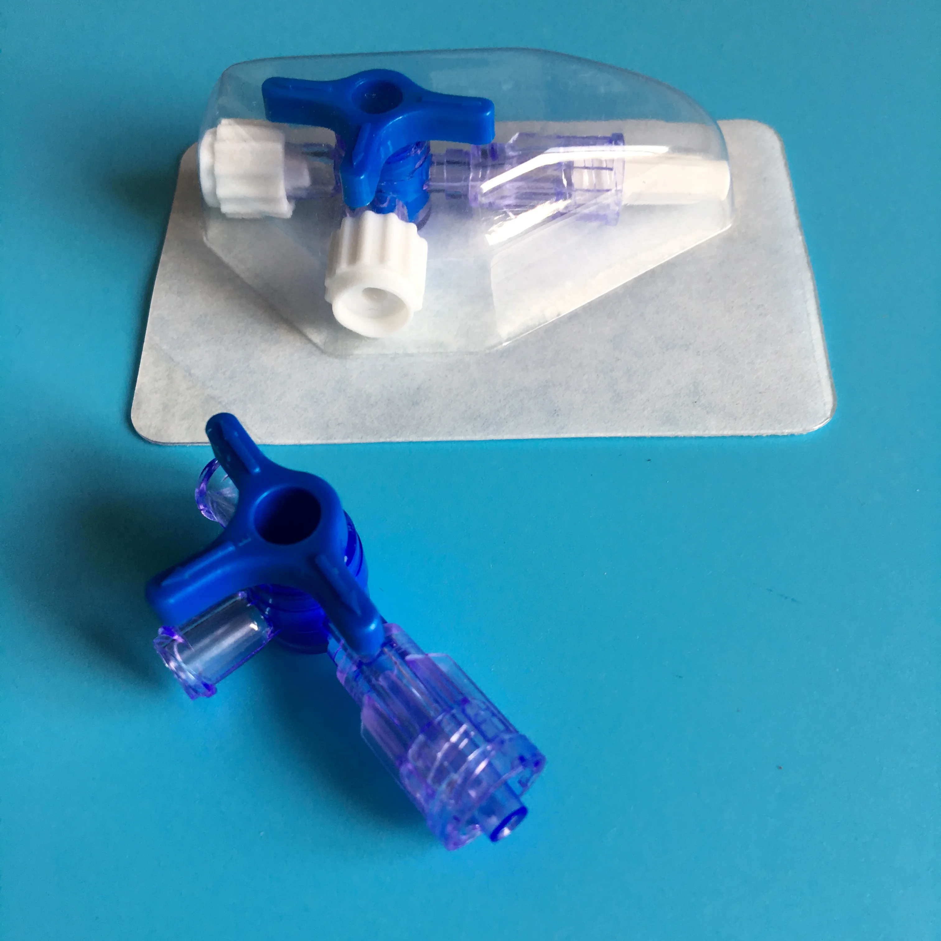 Three way stopcock with two female luer lock one male luer lock