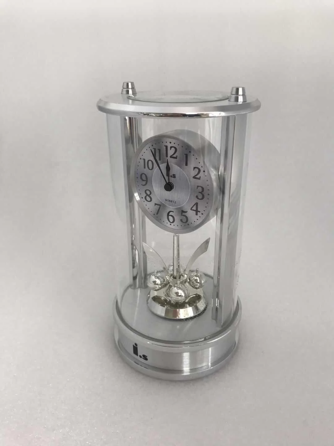 Aluminum table clock with rotating pendulum