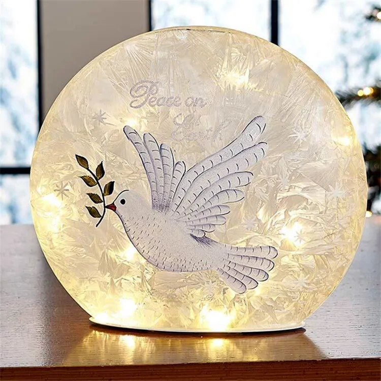 Hand drawn lit glass ball accent. Christmas decoration crack ball