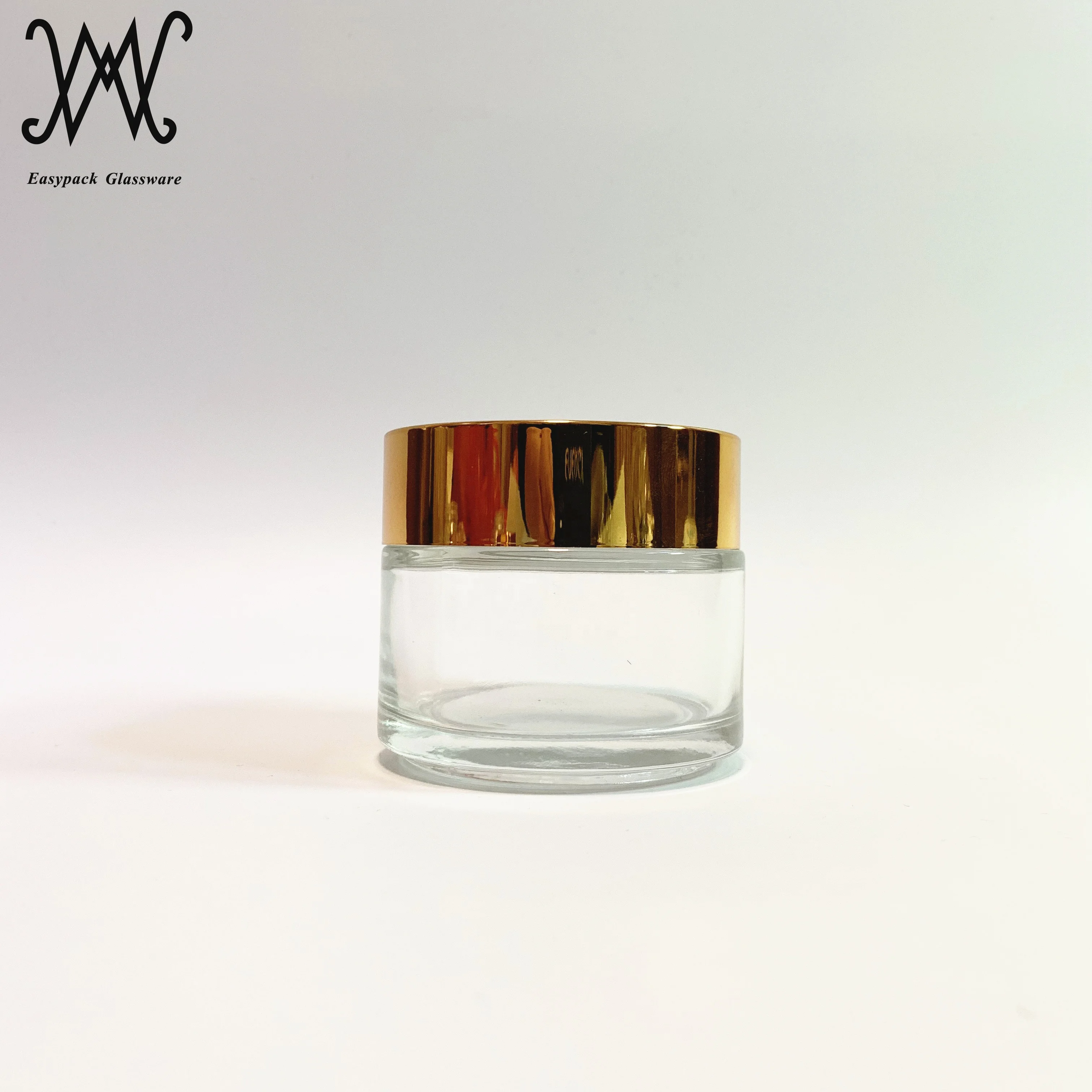 100g 100ml clear glass cosmetic packaging jar with gold metal lid for cream oil