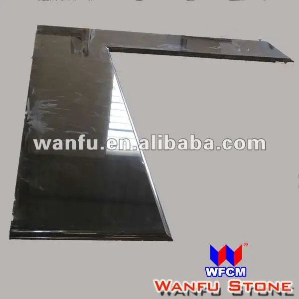 Black granite L shape kitchen worktop