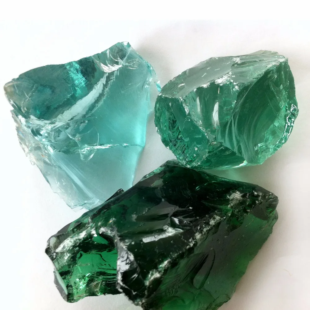 Natural turquoise green colored fire pit glass rocks