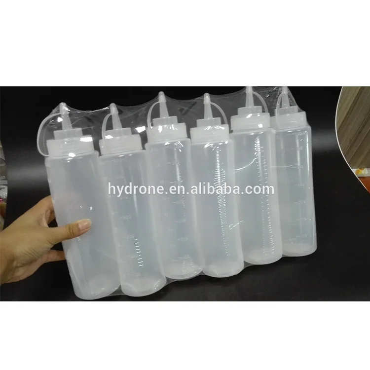 Clear plastic squeeze sauce bottle with shrink wrapping