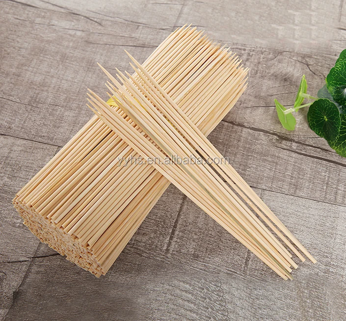 Pick up bamboo wooden sticks for meat