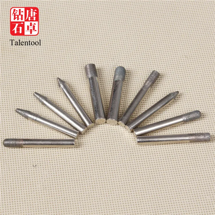 A diamond-encrusted diamond bit used for grinding and sculpting stone glass tiles