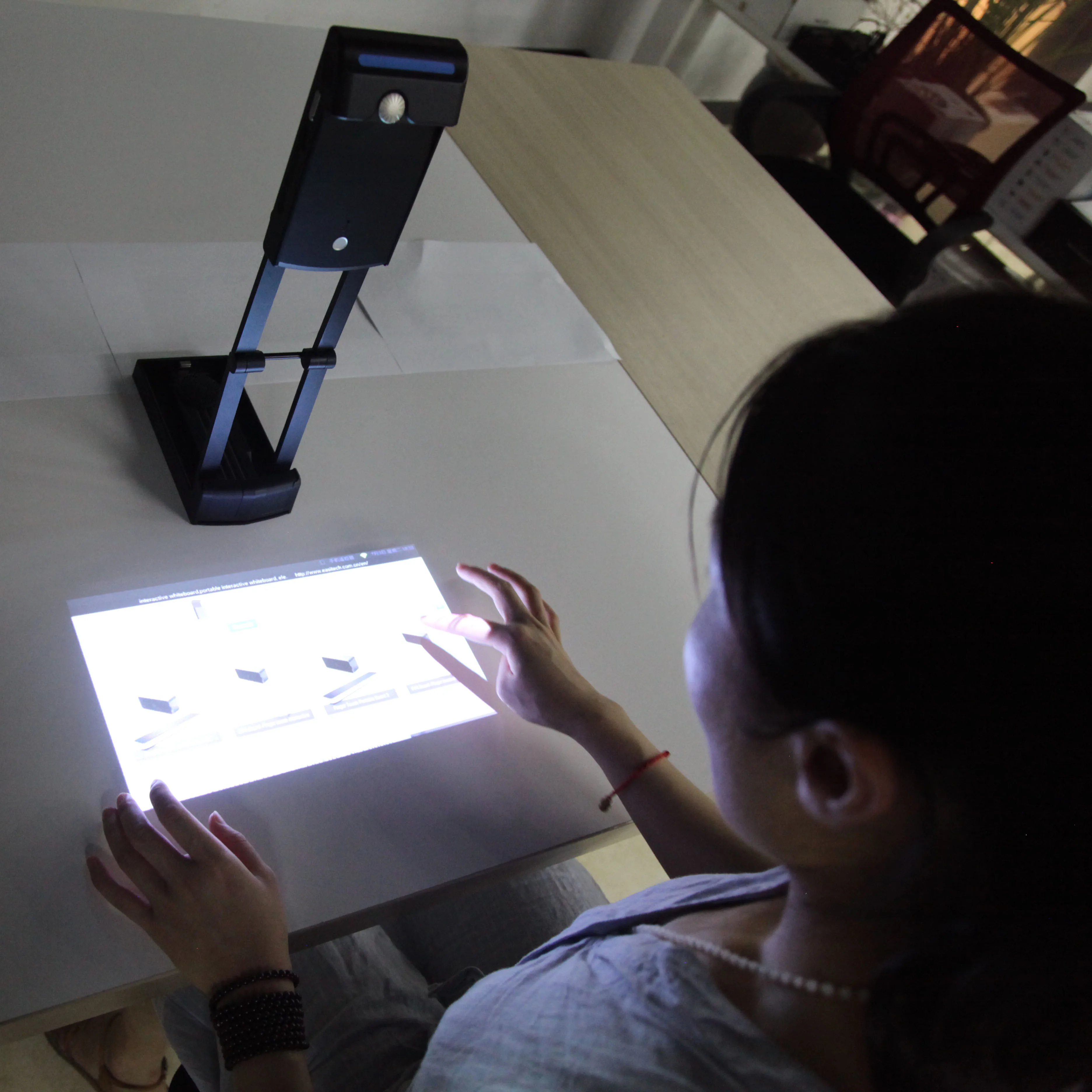 Portable interactive wifi multimedia projector,  laser image calibration technology