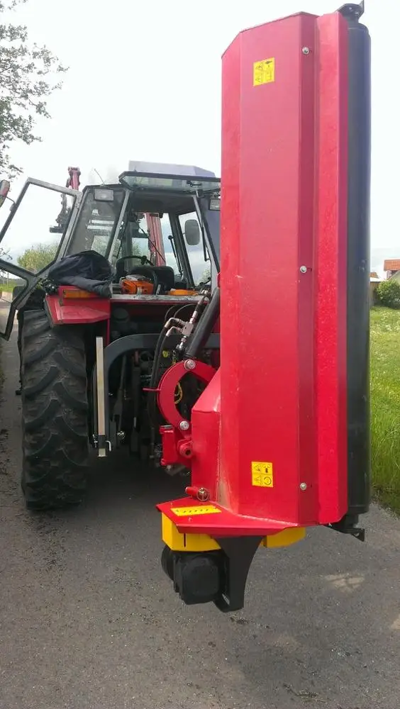 Tractor side mower attached to the rear suspension of the tractor and use the PTO