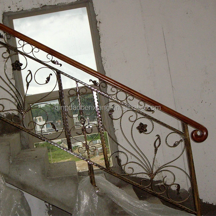 Wrought forged iron curved outdoor stair railings