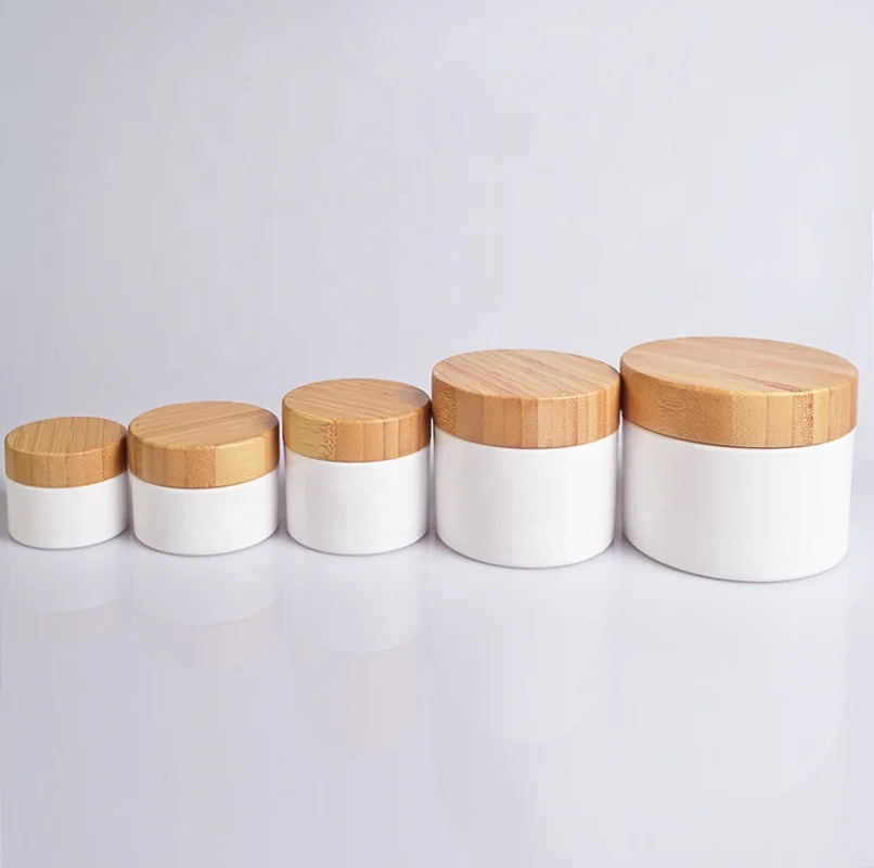 
Luxury cosmetic 20g 30g 50g 100g 150g PP plastic skin care cream jar with bamboo wood cap 