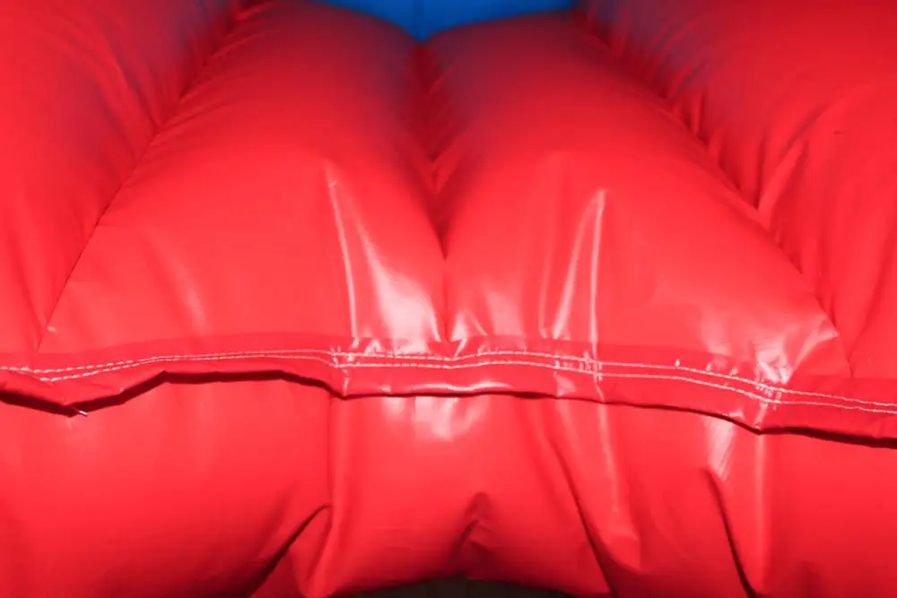 Giant Mechanical Rodeo Bull With Inflatable Mattress Interactive Game In Amusement Park