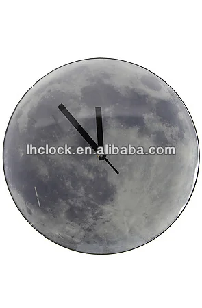 Moon Wall Clock glowing in the dark