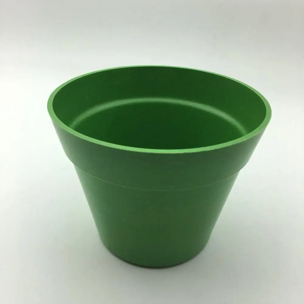 Пластиковые цветочные горшки зеленого цвета