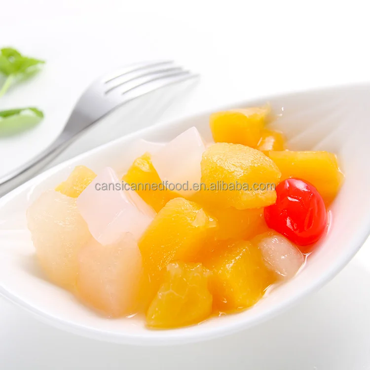 Тропические консервированные смешанные фрукты коктейли в легком сиропе