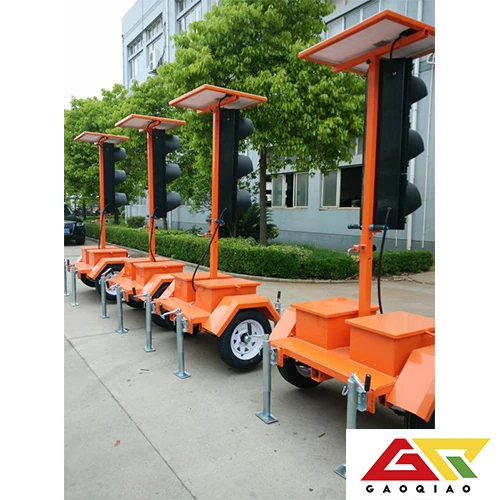 Portable traffic light wireless control mounted on trailers with solar power for temporary use
