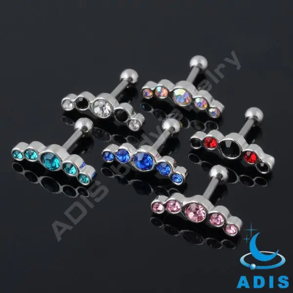 Jeweled ear tragus piercing with helix piercing