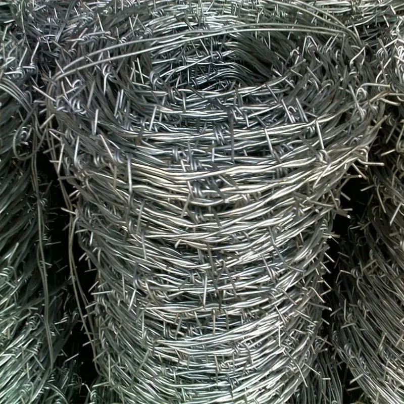 galvanized double twist barbwire and post used in fencing