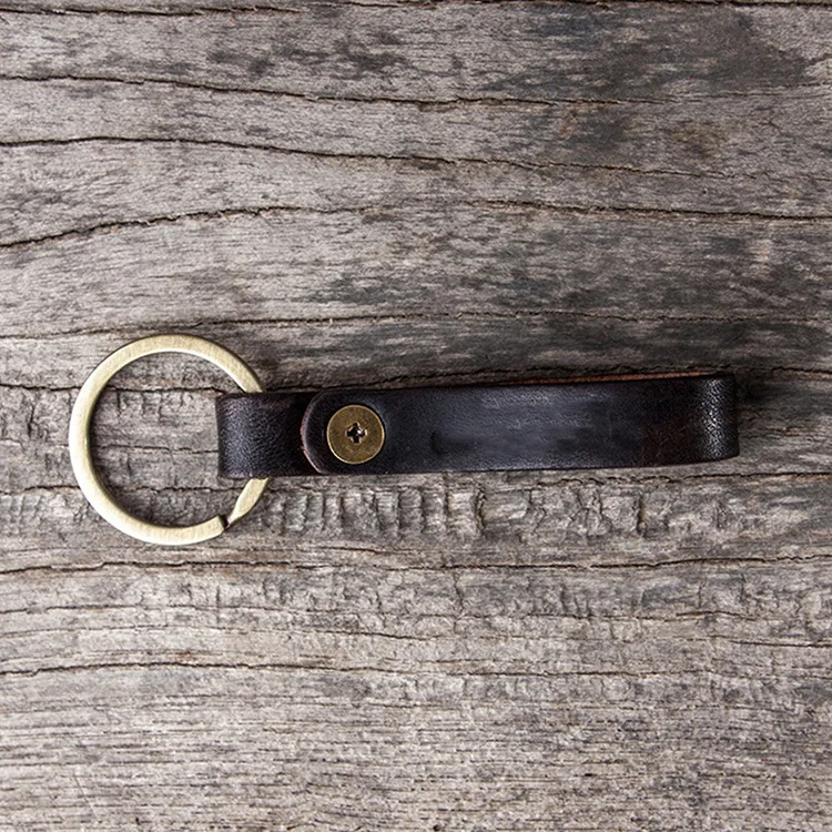 Кожаный брелок с логотипом под заказ оптовая продажа кожаных брелоков