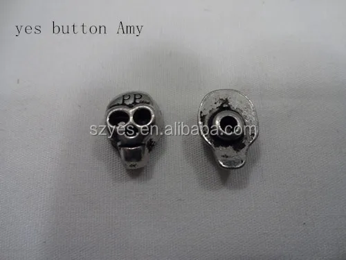 wholesale cool skull shape metal rivet with PP logo for garment