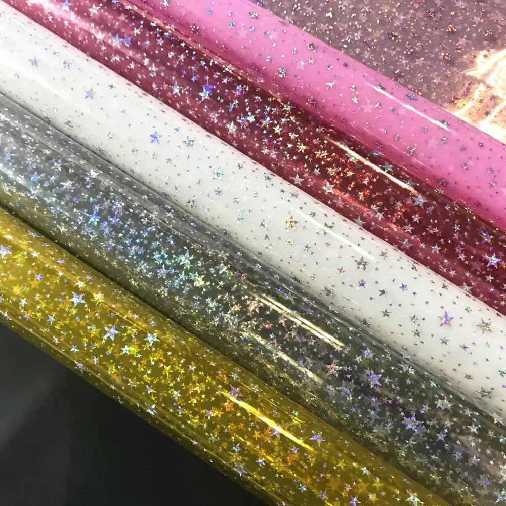 
transparent vinyl fabric with shiny star design for decoration 