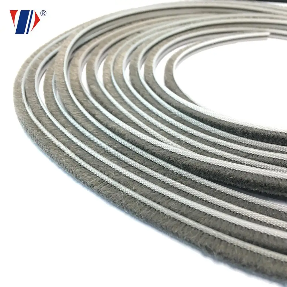Wool pile weather seal strip door