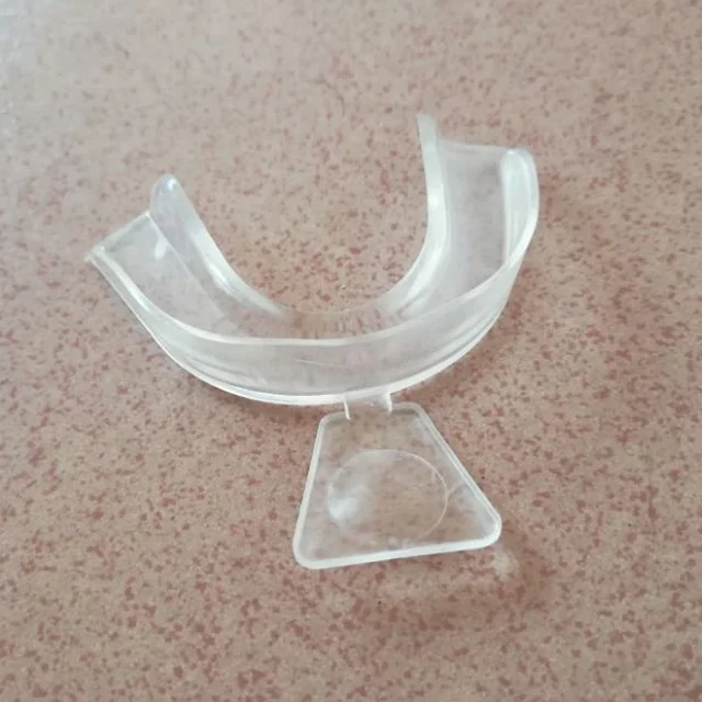 injection molded medical instrument teeth whitening mouth guard