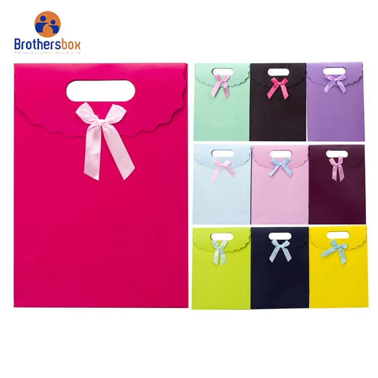 china supplier Accept Customised Logo Gift Carry Paper Shopping Bags kraft paper bag with handle