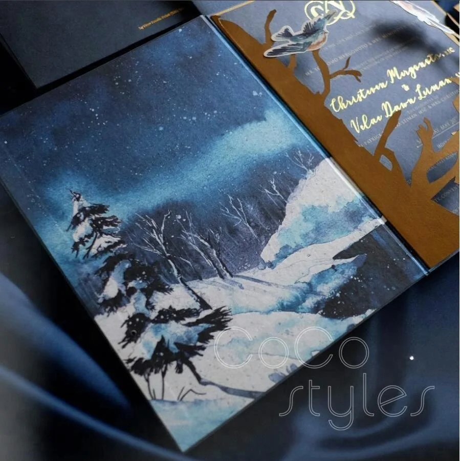 
Cocostyles bespoke creative gold foiling navy invitation card with snowflake and bird for winter wedding 