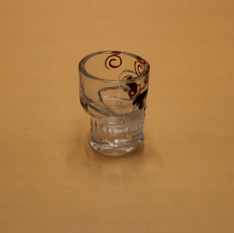 Colored skull shaped shot glasses cup