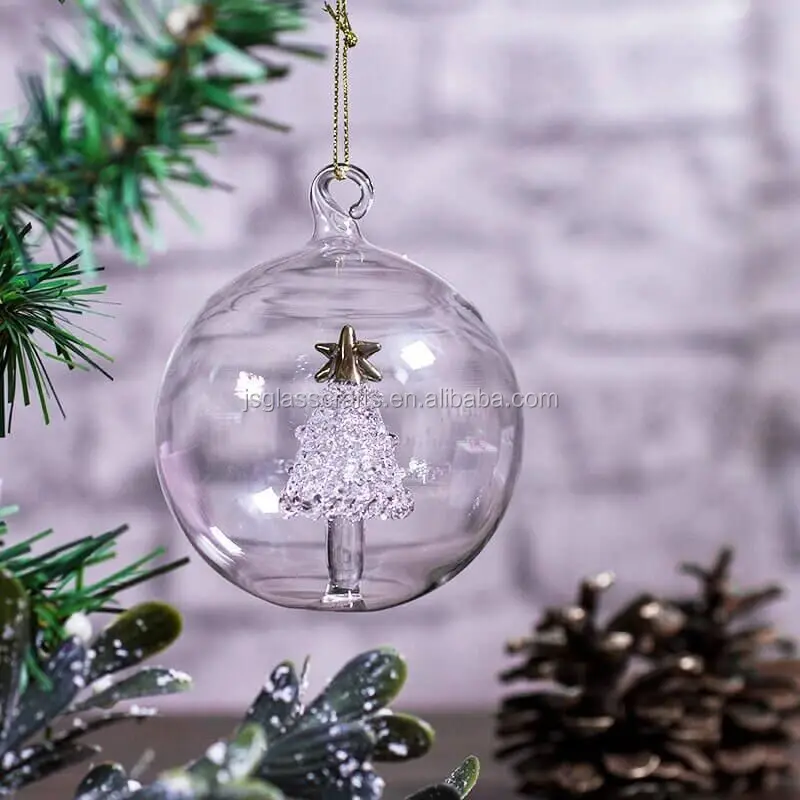 
Clear glass christmas hanging ball with tree inside for holiday decoration 