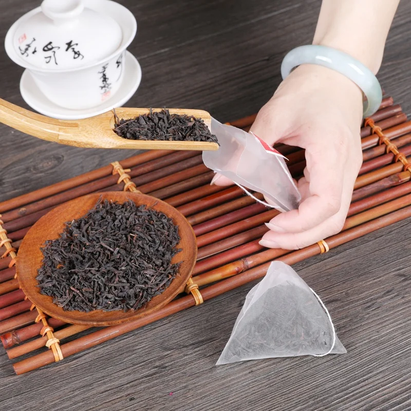 Nylon Empty Pyramid Tea Bag Custom Own Logo Seal Filter For Herb Tea