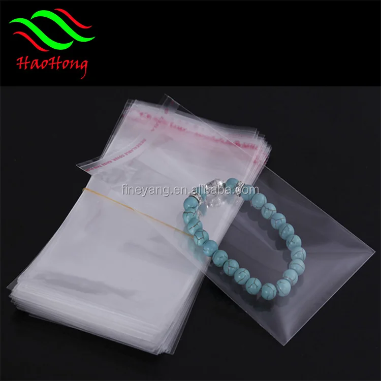 custom opp bopp cellophane cardboard header plastic ornaments packaging bags for jewelry accessories/bracelet/headgear etc.