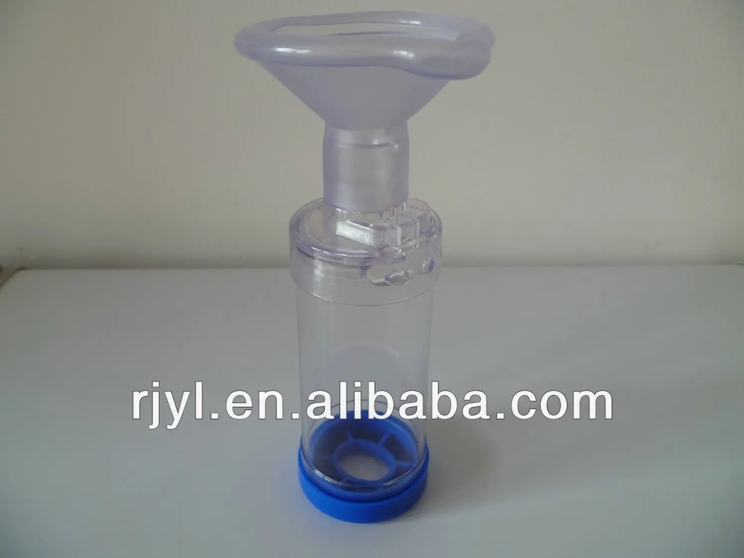Metered Dose Inhaler holding chamber for asthma treatment