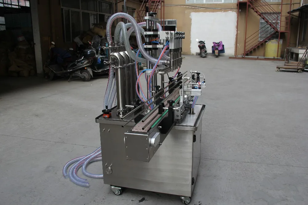 Automatic double head liquid filling machine,In-line arrangement water filling machine