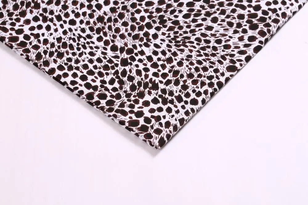 shaoxing winfar Textile Knitting Single Jersey Leopard Printed Polyester Spun 4 Way Stretch Fabric Suppliers in Shaoxing