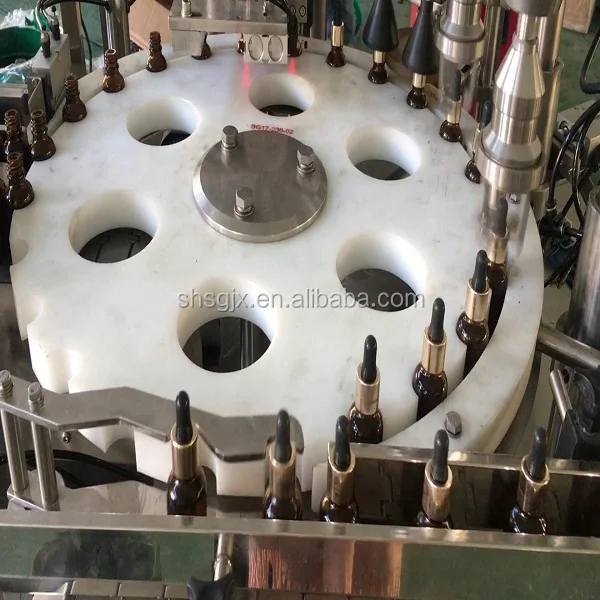 
High precision 200ml glass bottle filling machine for liquid syrup rotary dry syrup powder filling machine manufacturers 