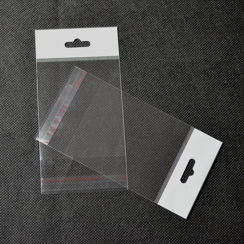 wholesale white header OPP bag plastic clothing  packaging bags for clothes transparent mini bag