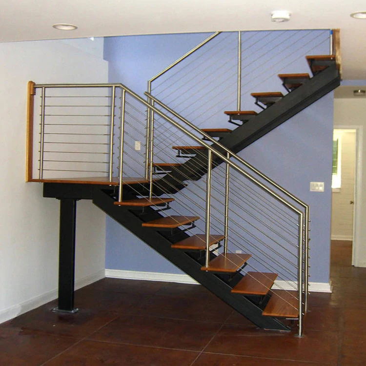 Hard wood steps and tempered glass railing Interior Steel wood staircase