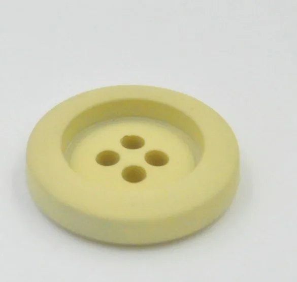 4 hole round debossed soft rubber clothing button