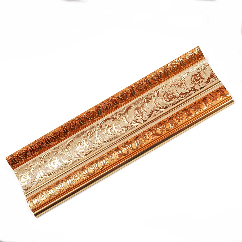 Polystyrene extruded interior mouldings with inserts