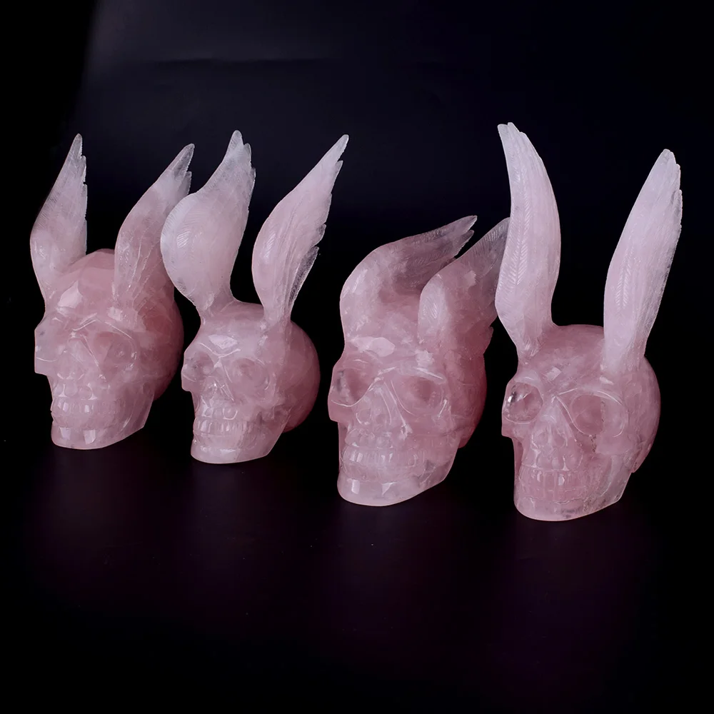 Natural rose quartz crystal hand carved Alien and Wing skull Sculpture for sale