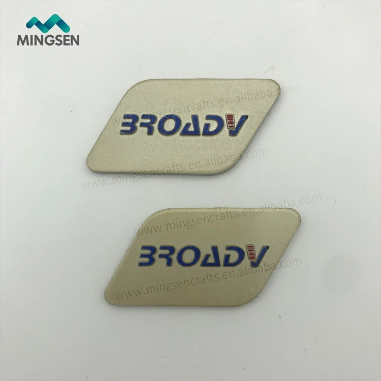 custom brand logo stamping raised adhesive aluminum sticker